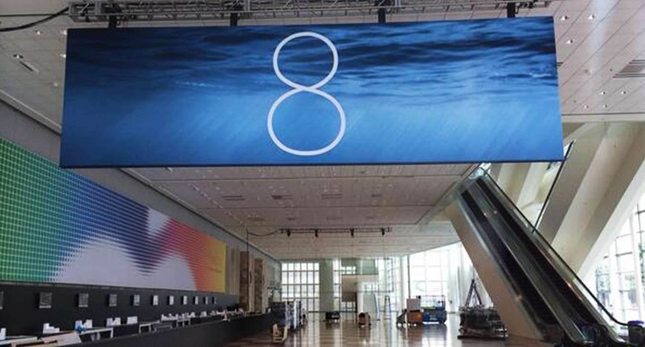 Moscone West i banner reklamujący iOS 8 ciekawostki WWDC14, Moscone West, iOS 8, iOS, Banner iOS 8, banner, Apple  Do WWDC14 pozostały jeszcze 3 dni, a już dziś w Moscone West został zawieszony pierwszy banner reklamujący iOS 8. iOS8.onetech.pl 3 1300x700