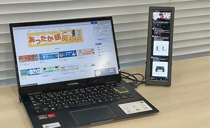 Nigdy nie widziałeś tak dziwnego monitora ciekawostki   Japońska firma Elsonic zapowiedziała monitor EK-MD088. To bardzo nietypowy gadżet - ma wąski i wysoki ekran zaprojektowany specjalnie do użytku z komunikatorami internetowymi i sieciami społecznościowymi. monitor1